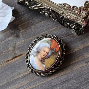 Vintage Oval Portrait Brooch with Ornate Metal Frame